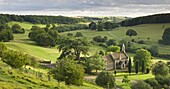 Church of St. Mary the Virgin, surrounded by beautiful countryside, Lasborough in the Cotswolds, Gloucestershire, England, United Kingdom, Europe