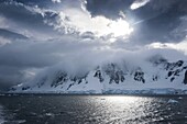 Dark clouds over the mountains and glaciers of Port Lockroy research station, Antarctica, Polar Regions