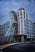 Dancing House (Fred and Ginger Building), by Frank Gehry built in 1996, at dusk, Prague, Czech Republic, Europe