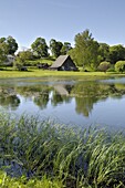 Ponds and traditional buildings, Turaida Museum Reserve, near Sigulda, Latvia, Baltic States, Europe