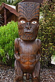 Carved wood figures, a means of preserving tribal history in an oral society, represent dead persons and manifestations of ancestors, Te Puia Maori Village, Rotorua, Taupo Volcanic Zone, North Island, New Zealand, Pacific