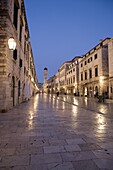 Early morning view along Stradun Street, tower of the Church of St. Saviour, Dubrovnik Old Town, UNESCO World Heritage Site, Dalmatia, Croatia, Europe
