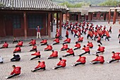 Students exercising and training at Wushu Institute at Tagou Training school for kung fu students, Shaolin Monastery, Shaolin, birthplace of Kung Fu martial art, Henan Province, China, Asia
