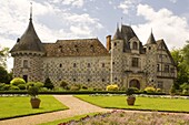 The chateau of St.-Germanine-de-Livet with a colourful checked facade and gardens, Normandy, France, Europe