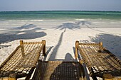 Sunbeds made from coconut wood and coir on Kiwengwa Beach, Zanzibar, Tanzania, East Africa, Africa