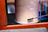 Barograph aboard expedition cruise ship MS Hanseatic (Hapag-Lloyd Cruises) indicates extreme low pressure as vessel approaches storm, near Deception Island, South Shetland Islands, Antarctica