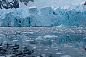 Chunks of ice, icebergs and entire landscapes reflected in the still and moving waters of Paradise Bay make for stunning images and interesting works of abstract art, Paradise Bay (Paradise Harbor), Danco Coast, Graham Land, Antarctica