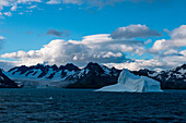 Iceberg and mountains in distance, Drygalsky Fjord, South Georgia Island, Antarctica