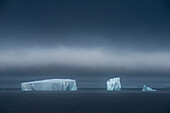 Icebergs and storm clouds, near Livingstone Island, South Orkney Islands, Antarctica