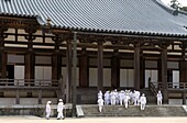 Pilgrims visiting the Buddhist Kondo Temple at the Dai Garan area of Mount Koya, Wakayama, Japan, Asia