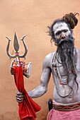 Sadhu with Shiva trident attending Haridwar Kumbh Mela, Haridwar, Uttarakhand, India, Asia
