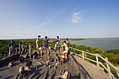 Tourists bathing in mud bath, Volcan de Lodo El Totumo, Mud Volcano, Colombia, South America