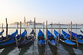Gondolas on the Lagoon, San Giorgio Maggiore in the distance, Venice, UNESCO World Heritage Site, Veneto, Italy, Europe