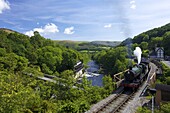Steam train pulls out of Berwyn station on the Llangollen Heritage Railway, Dee Valley, Denbighshire, Wales, United Kingdom, Europe