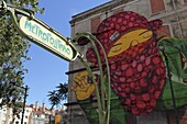 The Art Nouveau Metropolitano sign at Picoas and Gemeo's facade, part of the Crono urban art project, Lisbon, Portugal, Europe