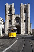 Se Cathedral and tram (electricos), Alfama, Lisbon, Portugal, Europe