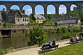 Banks of Rance River, view of old town houses, and viaduct, Dinan, Cotes d'Armor, Brittany, France, Europe