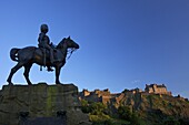 Royal Scots Greys Boer War memorial equestrian statue and Edinburgh Castle, Edinburgh, Scotland, United Kingdom, Europe