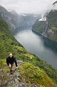 Hiking along Geirangerfjorden, near Skagefla, Geiranger, UNESCO World Heritage Site, More og Romsdal, Norway, Scandinavia, Europe