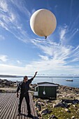 Inuit village, weather balloon launch, Ittoqqortoormiit, Scoresbysund, Northeast Greenland, Polar Regions