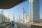 Metro and skyscrapers on Sheikh Zayed Road, Dubai, United Arab Emirates, Middle East