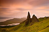 Old Man of Storr at dawn with Cuillin Hills in distance, near Portree, Isle of Skye, Highland, Scotland, United Kingdom, Europe