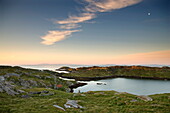 Dawn view towards the township of Manish and the coastline of Harris, Isle of Skye on the horizon, Outer Hebrides, Scotland, United Kingdom, Europe