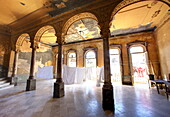 Interior of a once ornate and grand apartment building, now in a state of disrepair, Havana, Cuba, West Indies, Central America