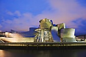 The Guggenheim, designed by Canadian-American architect Frank Gehry, on the Nervion River, Bilbao, Basque country, Spain, Europe