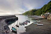 Fishing boats moored in the harbour at Clovelly,  Devon,  England,  United Kingdom,  Europe