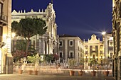 Piazza Duomo with Porta Uzeda in the background,  at night,  Catania,  Sicily,  Italy,  Europe