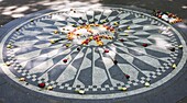 The Imagine Mosaic memorial to John Lennon who lived nearby at the Dakota Building,  Strawberry Fields,  Central Park,  Manhattan,  New York City,  New York,  United States of America,  North America