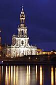 Reflections in the Elbe River of lights at night and the Catholic Hofkirche (Kathedrale St. Trinitatis) (St.Trinity Cathedral), Dresden, Saxony, Germany, Europe