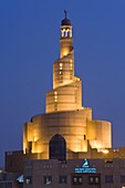 The illuminated spiral mosque of the Kassem Darwish Fakhroo Islamic Centre in Doha based on the Great Mosque of Al-Mutawwakil in Samarra in Iraq, Doha, Qatar, Middle East