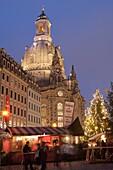 Christmas Market stalls in front of Frauen Church and Christmas tree at twilight, Neumarkt, Innere Altstadt, Dresden, Saxony, Germany, Europe