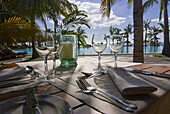 Restaurant table in front of the swimming pool of the Five star hotel Le Paradis, Mauritius, Indian Ocean, Africa