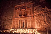 Nightime tourist show in candlelight, in front of the Treasury (El Khazneh), Petra, UNESCO World Heritage Site, Jordan, Middle East