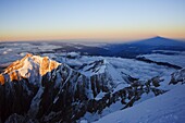 Sunrise, shadow of Mont Blanc, Mont Blanc range, Chamonix, French Alps, France, Europe