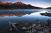 First light on the mountainside over a misty Patricia Lake, Jasper National Park, UNESCO World Heritage Site, Alberta, Rocky Mountains, Canada, North America