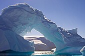 Magnificent arched iceberg near Enterprise Island, Antarctic Peninsula, Antarctica, Polar Regions