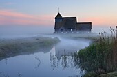 Fairfield church in dawn mist, Romney Marsh, near Rye, Kent, England, United Kingdom, Europe