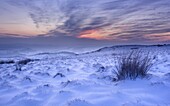 Late sunset on the snow at Hathersage Moor, Derbyshire, England, United Kingdom, Europe