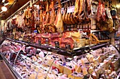 Hams hanging in market, Barcelona, Catalonia, Spain, Europe