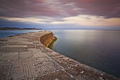 The stone Cobb or harbour wall, a famous landmark of Lyme Regis, Jurassic Coast, UNESCO World Heritage Site, Dorset, England, United Kingdom, Europe