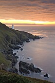 Spectacular sunrise behind Start Point Lighthouse in South Hams, Devon, England, United Kingdom, Europe