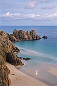 Pednvounder Beach and Logan Rock from the clifftops near Treen, Porthcurno, Cornwall, England, United Kingdom, Europe