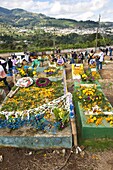 Day Of The Dead ceremony in cemetery in Santiago Sacatepequez, Guatemala, Central America