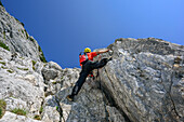 Man ascending fixed rope route, Hochthronklettersteig, fixed rope route Hochthron, Untersberg, Berchtesgadener Hochthron, Berchtesgaden Alps, Upper Bavaria, Bavaria, Germany