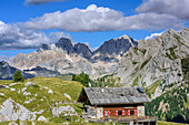 Hut Rifugio Vallaccia with Marmolada range in background, Vallaccia, Vallaccia range, Marmolada, Dolomites, UNESCO World Heritage Dolomites, Trentino, Italy