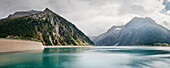 türkis farbiges Gletscher Schmelzwasser des Schlegeis Staudamm, Zillertal, Tirol, Österreich, Alpen